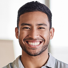 Smiling man in a professional headshot